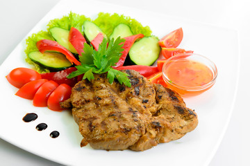 steak meat prepared with fresh vegetables 