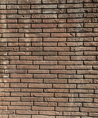 Fondo estudio ladrillo marrón con juntas negras. Texturas de ladrillos vistos.