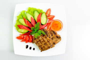 steak meat prepared with fresh vegetables 