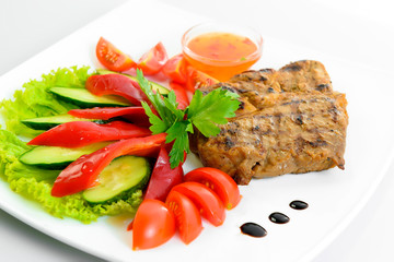 steak meat prepared with fresh vegetables 