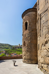 Stone walls of Metekhi Church of the Dormition of the virgin. Famous landmark in Tbilisi, Georgia.