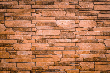 Textured texture of an old stone wall. Wallpaper for background and design