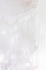 Bride's veil with embroidered elements. Bridal traditional symbolic accessory.