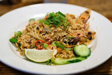 Chinese prawn fried rice in a plate.