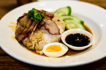 Thai roasted pork rice in a plate.