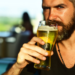 Man with beer. Retro man with a beer. Beer pubs and bars. Pub is relaxing place to have drink and relax.