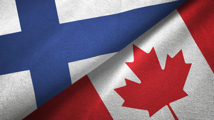 Finland and Canada two flags textile cloth, fabric texture © Aleks Taurus