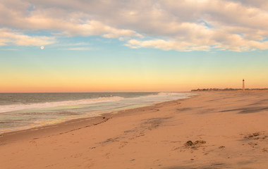 Beautiful calming sunrise at Cape May Lighthouse, NJ, in early spring, Atlantic Ocean