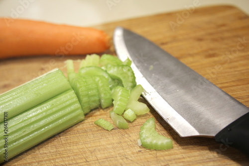 Macro sliced Celery, sliced celery on chopping board