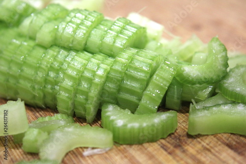 Macro sliced celery, sliced celery on chopping board
