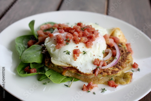 Zuchinnit and Sweet Potato Fritter with Fried egg and Bacon