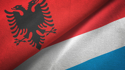 Albania and Luxembourg two flags textile cloth, fabric texture