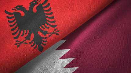 Albania and Qatar two flags textile cloth, fabric texture