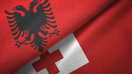 Albania and Tonga two flags textile cloth, fabric texture