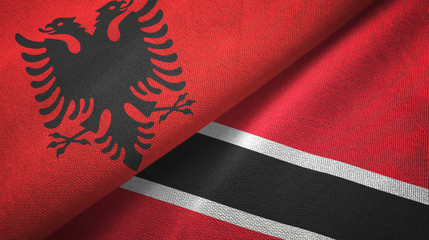 Albania and Trinidad and Tobago two flags textile cloth, fabric texture