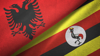 Albania and Uganda two flags textile cloth, fabric texture