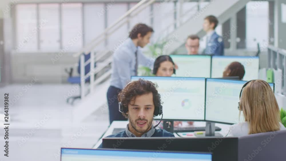 Poster in modern open space office: team of customer support people and salesmen working at their desktop c