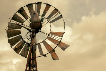 Rusted windmill in the countryside