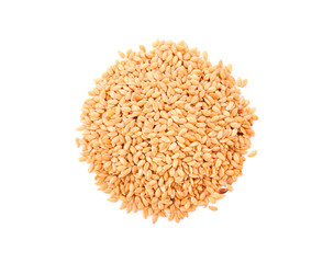 Golden flax seeds on a white background