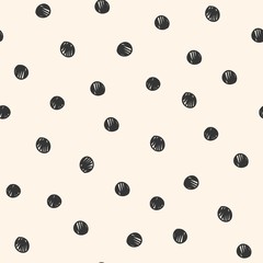 Seamless repeat pattern with hand-drawn scribble sketched polka dot on a cream background