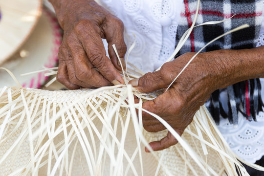 The villagers took bamboo stripes to weave into different forms for daily use utensils of the community’s people in Bangkok Thailand, Thai handmade product.  