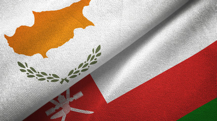Cyprus and Oman two flags textile cloth, fabric texture