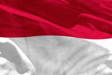 Waving Indonesia flag for using as texture or background, the flag is fluttering on the wind