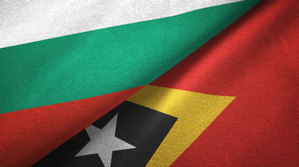 Fototapeta premium Bulgaria and Timor-Leste East Timor two flags textile cloth, fabric texture