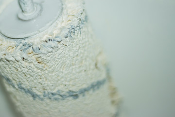 Close up of a color paint roller © SanjoyKrishna