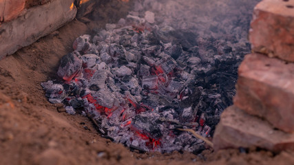 embers from the fire for cooking. campfire