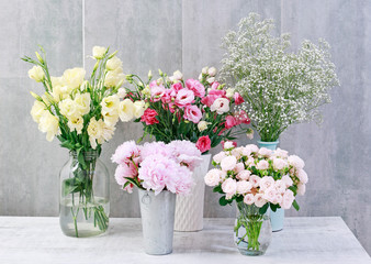 Bouquets of colorful flowers. Peony, rose, lisianthus, gypsophila paniculata.
