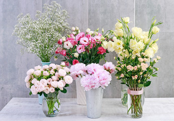 Bouquets of colorful flowers. Peony, rose, lisianthus, gypsophila paniculata.