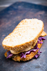 Freshly cooked sandwiches with roasted chicken, purple cabbage and mushrooms. Selective focus. Shallow depth of field.