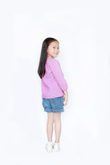 Rear view smiling little child girl over white background. Freedom kid movement concept.