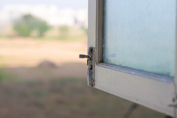 Open Window, blurry outside view through window