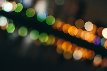 Unfocused abstract bokeh. Defocused and blurred many round light.