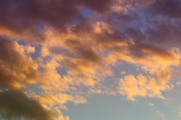 beautiful toned sun colored clouds on the sky for using in design as background.