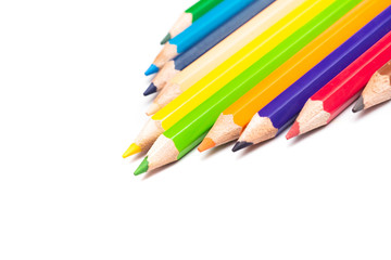 Colored pencils background with a variety of colors. Many different color pencils on white background. Colored Pencils for School or Professional Use.