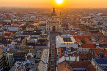 Budapest, Hungary - Sunrise over Budapest on an aerial drone shot with St. Stephen's Basilica and Zrinyi street