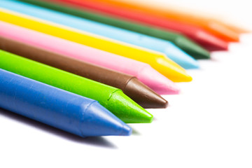 Colorful wax crayons collection isolated on white background. Colorful multi colored crayons for school ,kids and professional use.