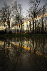 Obraz premium Coucher de soleil en réflet