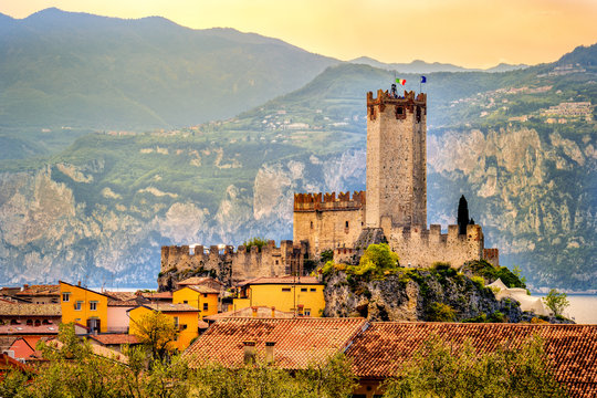italian village malcesine peaceful town and castle on Garda Lake waterfront romantic idyllic picturesque sunset