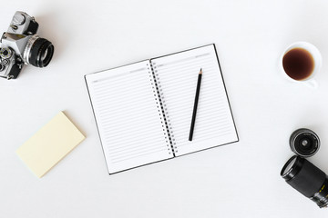 top view open blank notebook and old camera sticky notes coffee top view flat layout