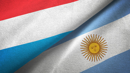 Luxembourg and Argentina two flags textile cloth, fabric texture