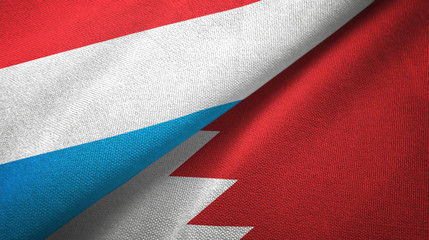 Fototapeta na wymiar Luxembourg and Bahrain two flags textile cloth, fabric texture