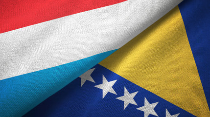 Luxembourg and Bosnia and Herzegovina two flags textile cloth, fabric texture