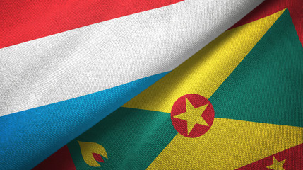 Luxembourg and Grenada two flags textile cloth, fabric texture