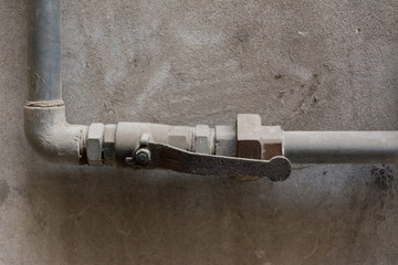 Turning on or turning off water supply in the boiler room. Plumbing concept.