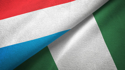 Luxembourg and Nigeria two flags textile cloth, fabric texture