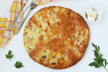 Khachapuri flatbread - a national flour dish in Georgia, located on a white background